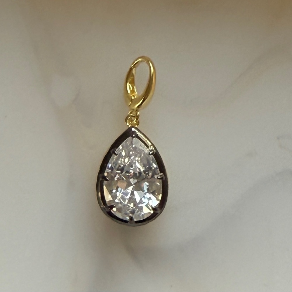Elegant Gold and Silver Teardrop Pendant